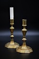 A pair of antique 1700/1800 century brass candlesticks, Height: 19.5cm.