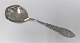 Silver (830) serving spoon with owl motif. Length 20 cm. Produced 1905.