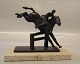 Rider and horse in bronze on marble base  12.5 x 22 cm H: 19 cm  Show Jumper