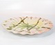 Large dinner plate in light colors of Italian porcelain. 
5000m2 showroom.
