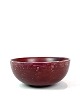 Keramik skål med okseblods farvet glasur, model 20.717, af Axel Salto for Royal 
Copenhagen. 
5000m2 udstilling.
Flot stand
