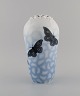 Antique Royal Copenhagen art nouveau vase in openwork porcelain with 
hand-painted butterflies. Early 20th century.
