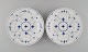 Two antique Royal Copenhagen Blue Fluted Plain dinner plates. 1890s. Model 
number 1/175.
