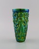 Zsolnay vase in glazed ceramics modeled with women picking grapes. Beautiful 
luster glasses. Mid-20th century.
