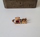 Pendant in 18 kt gold in the form of a sleigh pulled by two oxen