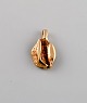 Scandinavian jeweler. Organic shaped pendant in 14 carat gold.
