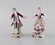 Two German antique porcelain figurines. Rococo couple. 19th century.
