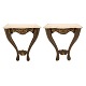 Pair of partly 
gilt 
Rococostyle 
console table 
with ...