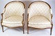 Et sæt af to louise seize stole i poleret mahogni med lyst dekoreret stof fra 
1880