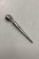 Sewing gear in 
silver