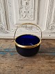 1800s sugar 
bowl in blue 
glass with 
brass mounting