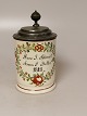 Faience mug 
with name tag 
and dated 1818