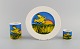 Corneille (Guillaume Cornelis van Beverloo), Hollandsk CoBrA kunstner 
(1922-2010). Kaffekop, tallerken og æggebæger i porcelæn dekoreret med fugle 
over mark med solopgang. 1980/90