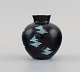European studio ceramicist. Unique vase in glazed stoneware. Light blue touches 
on black background. 1960s / 70s.
