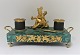 Ink house with 
base of 
malachite, and 
gilded soldier. 
...