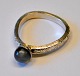 Sterling silver 
ring with 
moonstone, 20th 
century Ib ...