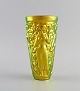 Zsolnay vase in glazed ceramics modeled with women picking grapes. Beautiful 
luster glasses. Late 20th century.
