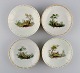 L'Art præsenterer: Fire antikke Royal Copenhagen porcelænsskåle med håndmalede landskaber og gulddekoration. ...