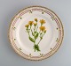 Royal Copenhagen Flora Danica lunch plate in hand-painted porcelain with flowers 
and gold decoration. Model number 20/3550.
