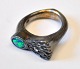 Sterling sølv 
oxideret 
fingerring med 
opal og 
brillant, ...
