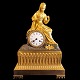 A French bronze figural mantel clock, around 1830