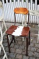 Old industrial work chair from the Georg Jensen factory...
Seat covered with cowhide...
