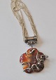 Sterling 
necklace with 
flower, 20th 
century.