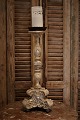 Old French wooden candlestick with fine carvings, remnants of old silver coating 
and has a very fine patina....