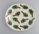 Oval Arabia dish in glazed stoneware with hand-painted fir cones. Finnish 
design. Dated 1972.

