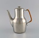 Just Andersen (1884-1943), Denmark. Art deco tin coffee pot with wicker handle. 
1940s. Model number 2758.
