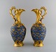 Limoges, Perlam France. Two large jugs in hand-painted porcelain decorated with 
gold leaf. 1930s.
