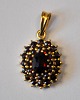 Gilded silver 
pendant with 
garnets, 20th 
century