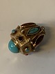 Gold pendant with turquoise in 18 carat gold
Stamped 750
Height 30.56 mm