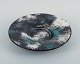 Svend Hammershøi for Kähler, HAK.
Round dish in glazed stoneware. Beautiful black-green double glaze.