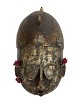 Small mask from Mali made of wood, metal and 
textile. The Marka people, 20th century.