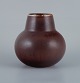 Carl-Harry Ståhlane (1920-1990) for Rörstrand, round ceramic vase with glaze in 
shades of brown.
