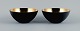 Two "krenit" bowls in metal.
Gold.