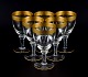 Rimpler Kristall, Zwiesel, Germany, six hand blown crystal red wine glasses with 
gold rim decorated with grapes and vine leaves.