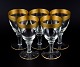 Rimpler Kristall, Zwiesel, Germany, five hand blown crystal white wine glasses 
with gold rim decorated with grapes and vine leaves.