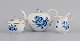 Meissen, Germany, teapot, creamer and sugar bowl.
Hand painted in blue with flowers and insects. Gold decoration on rims.