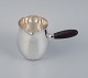 Georg Jensen Art Nouveau milk jug in sterling silver with ebony handle.