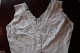 Good old blouse/top without sleeves and with 
buttons made of fabric
Very beautiful and special
The antique, Danish linen and fustian is our 
speciality and we always have a large choice of 
tea towels, table clothes, napkin, clothes etc.