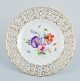 Meissen, Germany, openwork plate hand painted with flowers and butterflies.