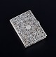 Russian Cigarette case, in silver with filigree work.