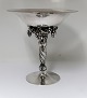 Lundin Antique 
presents: 
Georg 
Jensen. 
Sterling (925). 
Grape bowl. 
Model 263. 
Height 19 cm. 
Diameter 18,1 
cm. ...