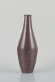 European studio ceramicist, ceramic vase with speckled glaze in brown tones.