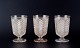 Baccarat, France, set of three Art Deco crystal wine glasses.