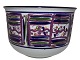 Royal Copenhagen art pottery
Large unique round bowl with purple decoration