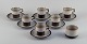 Bing & Grøndahl, Tema, et sæt på seks kaffekopper med tilhørende underkopper i 
stentøj samt sukkerskål.