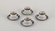 Arabia, Finland. "Karelia". Four sets of coffee cups and saucers in stoneware.